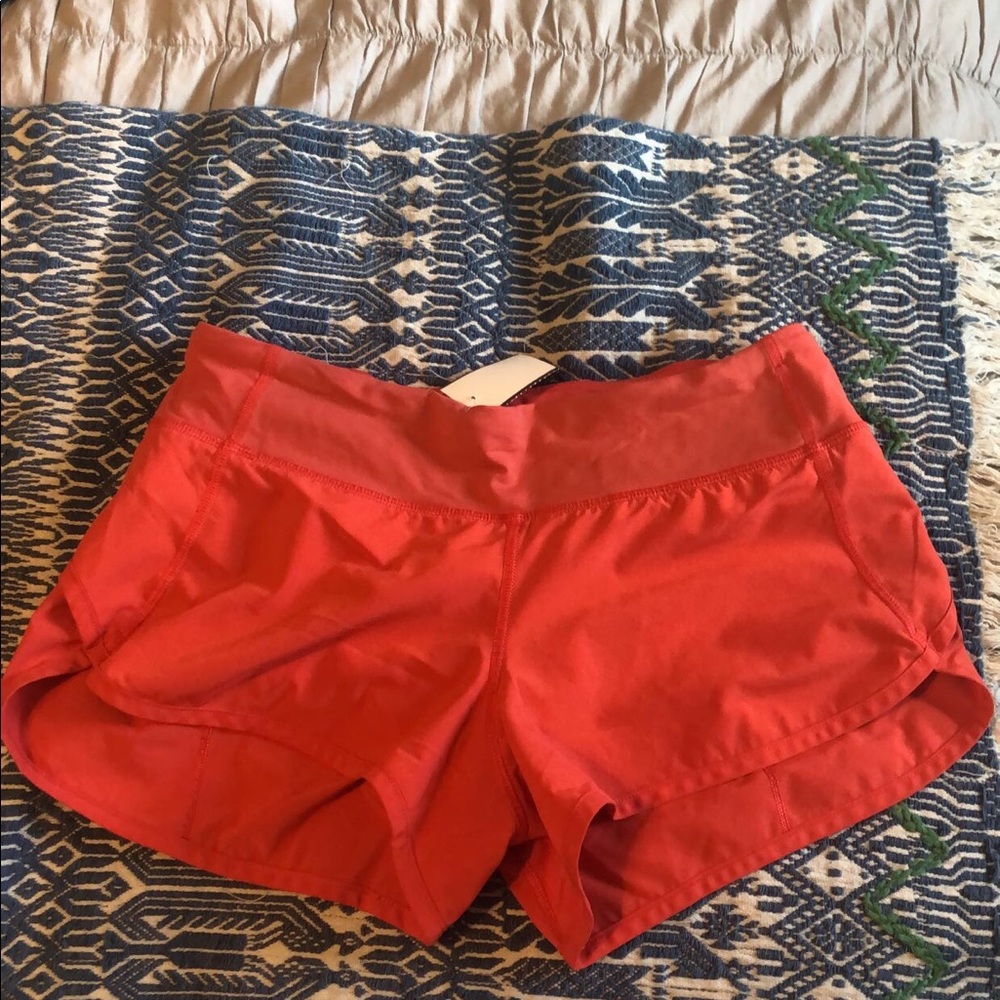 Red Lululemon Speed Up Shorts, size 4, 2.5”